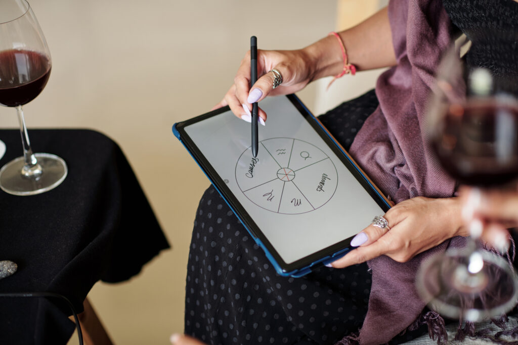 astrologer drawing natal card on tablet 2025 01 31 06 35 55 utc
