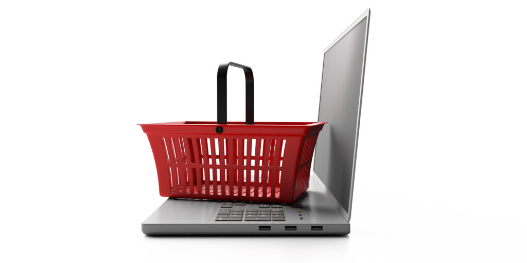 shopping basket on a laptop isolated on white back 2024 12 07 19 51 19 utc