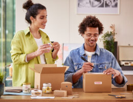 couple running online business from home packing a 2024 10 19 04 58 13 utc