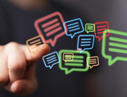 hand pointing to colorful digital message symbols 2025 02 09 03 05 05 utc