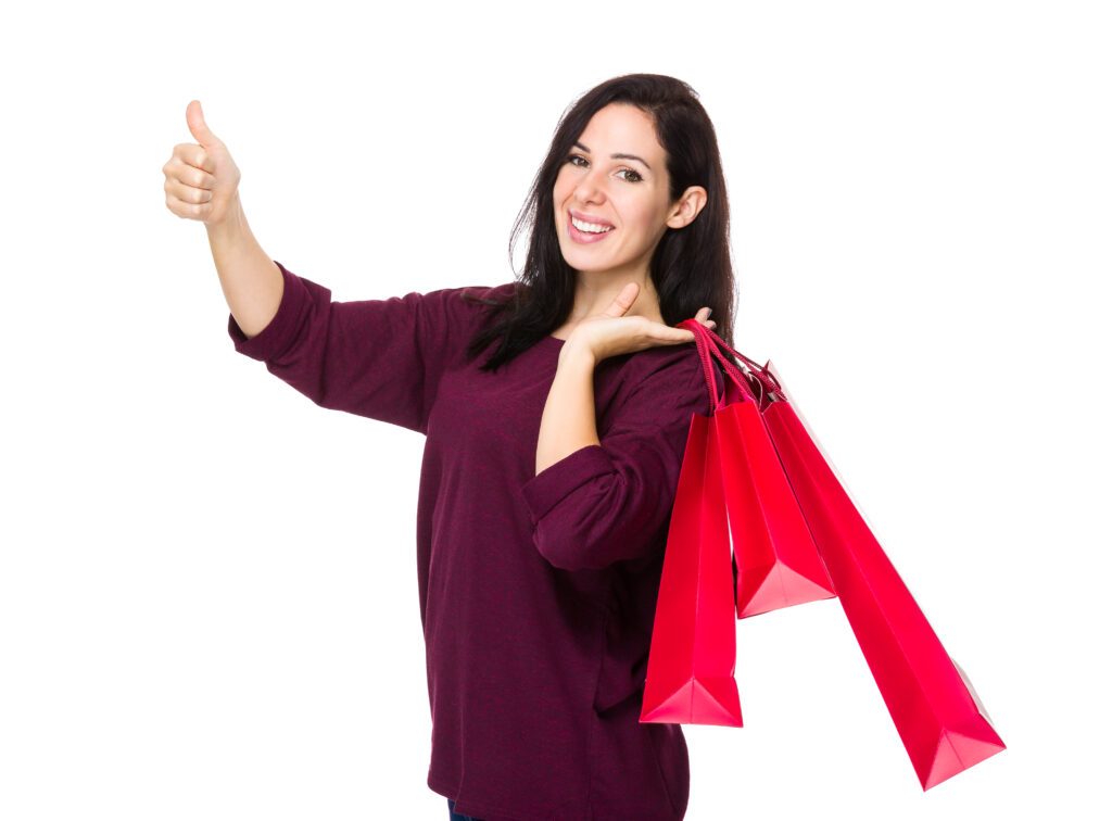 woman hold with shopping bag and thumb up 2025 03 26 11 57 21 utc